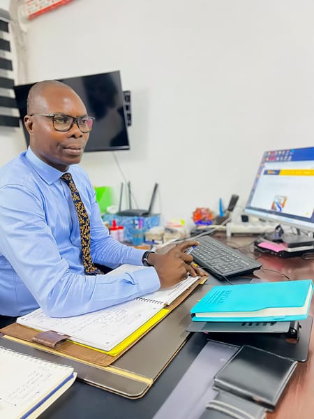 Me Laurent Mahugnon DOSSOU